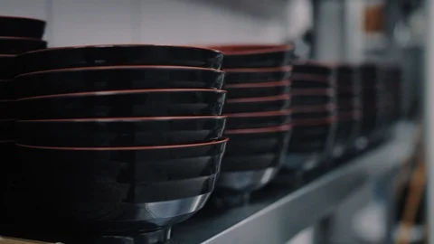 Black cups are on the shelf Stock-Footage 112574418