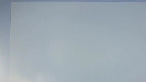 A black cursor blinking on a white and empty text document. Stock Footage 167754141