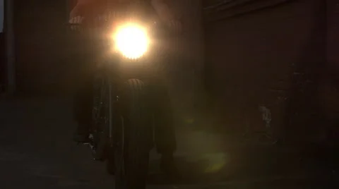 Black custom made cafe racer bike. Handsome man sitting on a motorbike. The l Stock Footage 61329612