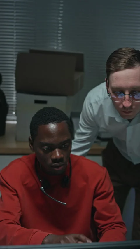 Black Customer Support Agent Receiving Help from Supervisor Stock Footage 346710745