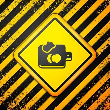 Black Cutting board with vegetables icon isolated on yellow background. Chopping Stock Illustration