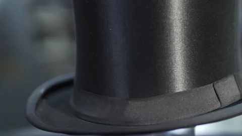 Black Cylinder turning with backlight Stock Footage 159203546