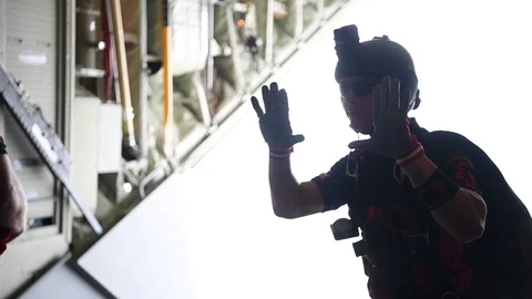 Black Daggers parachutist counting down hand signal aboard C-130 Hercules Stock Footage 108312325