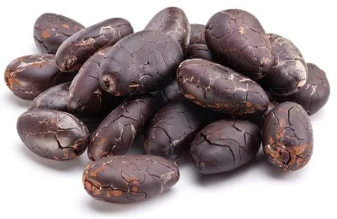 Black dates pile on white background healthy snack Stock Photos