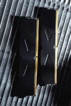 Black DDR5 RAM memory modules placed on a aluminum radiator Stock Photos