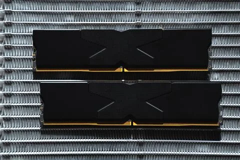 Black DDR5 RAM memory modules placed on a aluminum radiator Stock Photos
