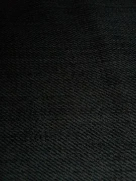 Black denim close up fabric texture threads background Stock Photos