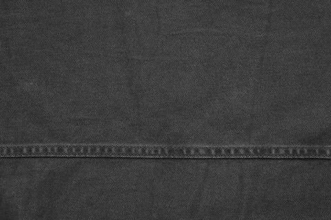 Black denim with stitching Stock Photos