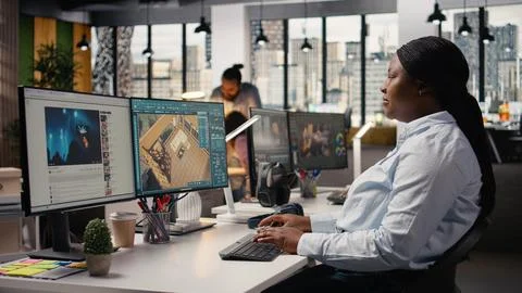 Black designer using architectural software and virtual assets for floor plan 스톡 사진