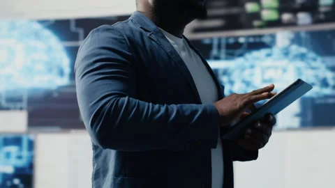 Black developer programming software and explores code snippets Stock Footage 312304699