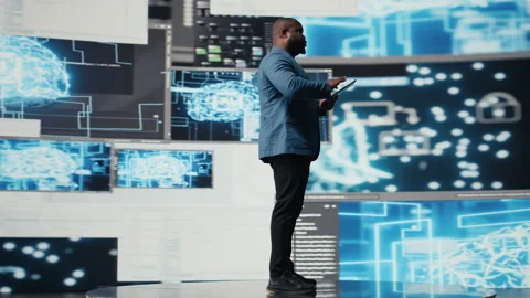 Black developer programming software and explores code snippets Stock Footage 312414189