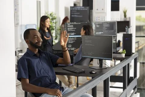 Black Developer Using Hand Gestures for Virtual Interface in Startup Office Stock-Fotos