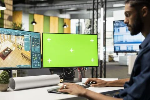 Black developers team preparing apartment building layout next to mockup screen Foto stock