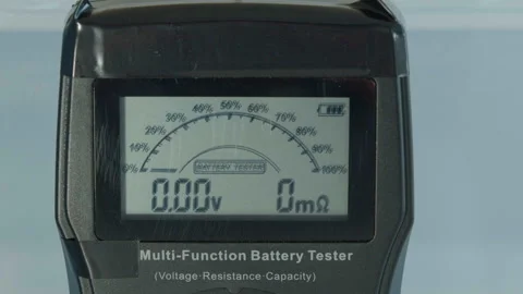 Black device displays battery test metrics Stock Footage 340530946