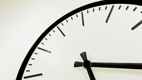 Black dial of mechanical watch with fast rotating hands on white background. clo Stock Footage 311933707