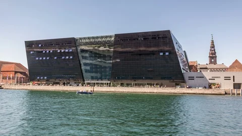 The Black Diamond, a modern Library building at the waterfront of Copenhagen Stock Footage 99160676