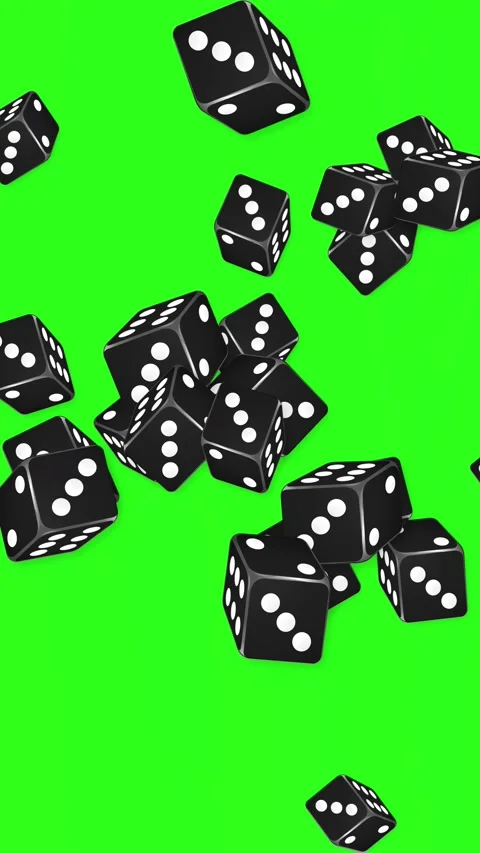 Black Dice Falling and Tumbling Against a Green Screen Background Stock Footage 344831347