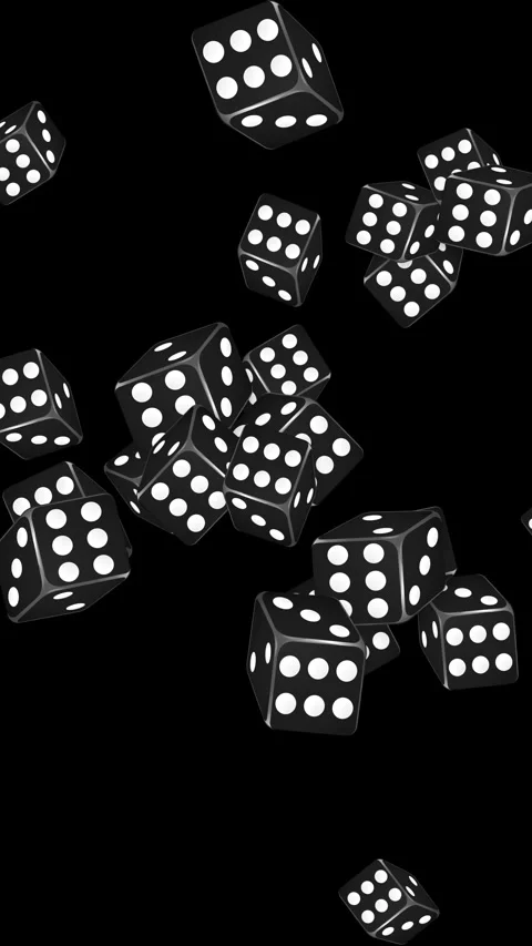 Black Dice Falling and Tumbling Against a Solid Black Background Stock Footage 345311195