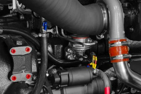 Black diesel engine. Fragment of a diesel motor close-up. Selective on the fu Stock-Fotos