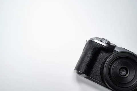 Black digital camera with white background Stock Photos