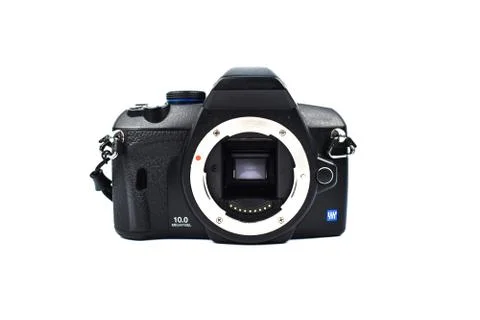 A black digital camera without a lens placed on top of a white background Stock Photos