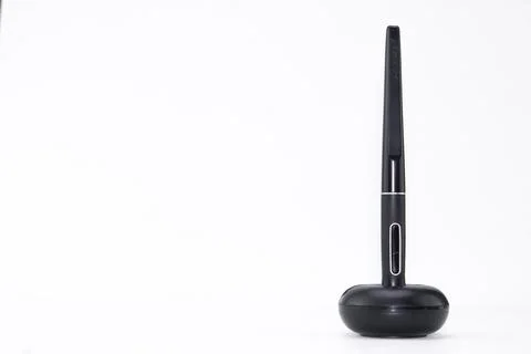 Black Digital Pen and Stand on White Background, Graphic Design Tool. Stock Photos