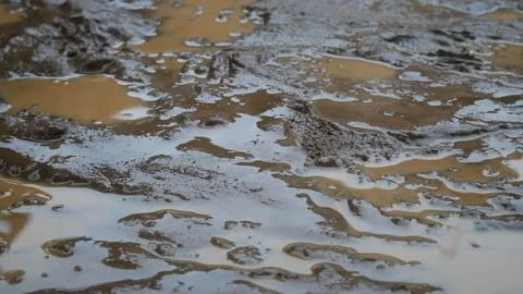 Black dirt mud texture background mixed with sand Stock Photos