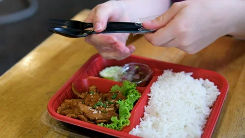 Black disposable plastic tableware, fork, knife, open, start eating, delivery Stock Footage 317878591