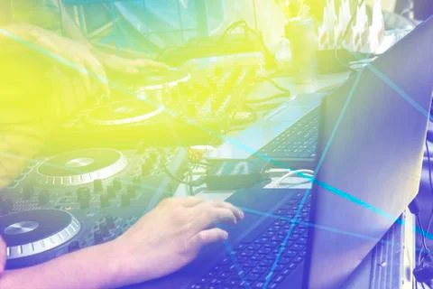 Black dj controller with hands dj , setup with stand laptop. Stock Photos