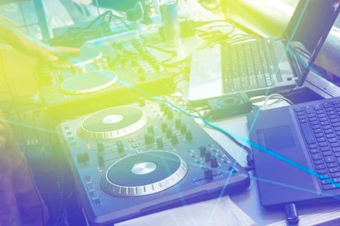 Black dj controller with hands dj , setup with stand laptop. Stock Photos