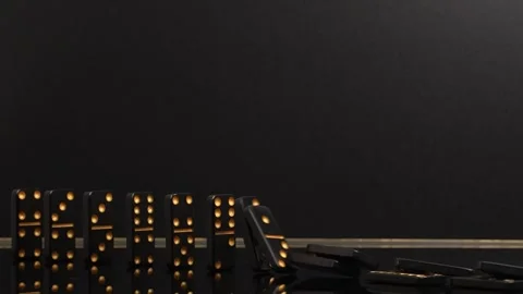 Black Dominoes falling down one after the other Video stock 249904808