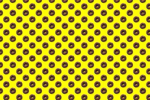 Black donuts with red glaze on yellow background seamless pattern top view. F Stock Illustration