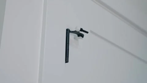 Black Door Stopper Hardware on White Interior Closet Door Stock-Footage 344021207