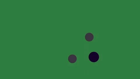 Black dots on a green background and screen with hole in the middle two Stock Footage 335977674
