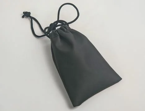 Black Drawstring Fabric Pouch Isolated on White Background Фото