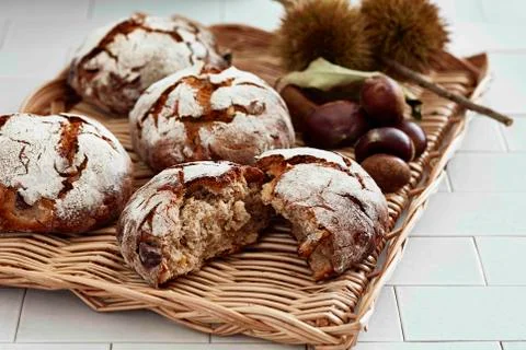 Black dried bread with nutshell on tray Stock Photos