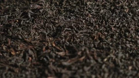 Black dry Tea Wallpaper. Black Tea Leaves rotating on Turntable. Stock Footage 211354540