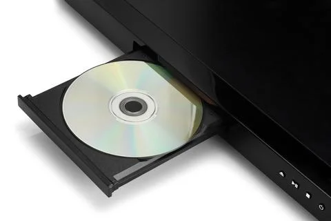 Black DVD player with silver CD open on white background Stock Photos