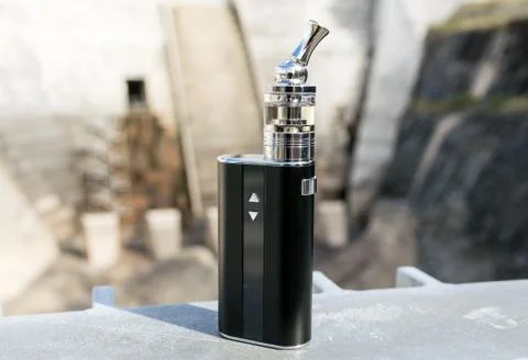 Black e-cig mod glass tank Stock Photos