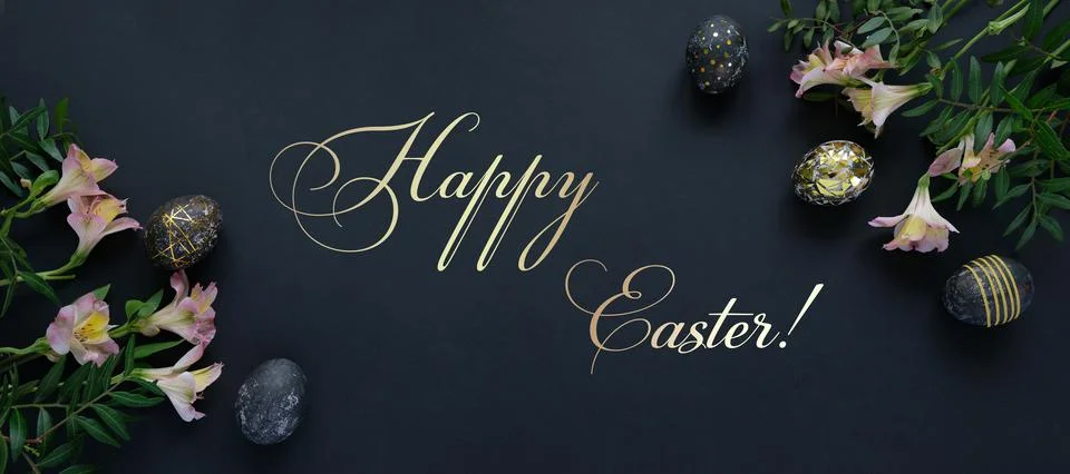Black easter eggs with gold pattern and pink flowers Stock Photos