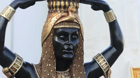 Black Egyptian-style goddess statue at an African Exhibition. Stock Footage 341446773