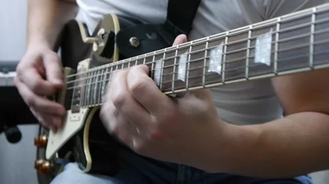 Black electric guitar Stock Footage 64274864