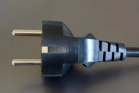 Black electric plug closeup. Stock Photos