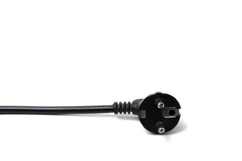 Black electrical cable with a plug on a white background.Isolate.Copy space.C Stock Photos