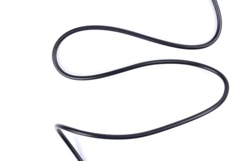 Black electrical  flexible wire isolated on white background. Network, connec Stock Photos