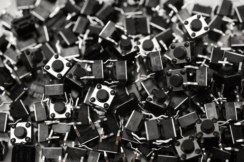 Black electronic buttons on a white background. Electronic elements. Power .. Stock-Fotos