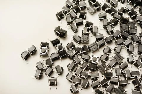 Black electronic buttons on a white background. Electronic elements. Power .. Stock Photos
