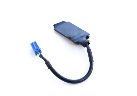 Black electronic bypass module with blue connector for vehicle Stockfoto's
