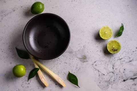 Black empty plate on marble, flatlay - stylish tableware, table decor and foo Stock Photos
