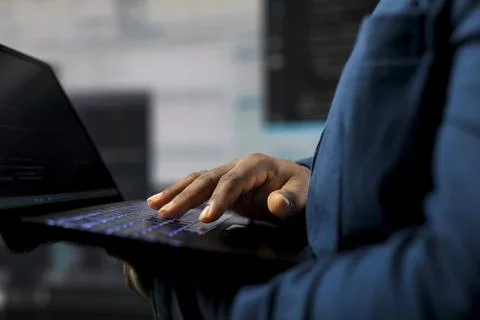 Black engineer explores algorithm design and binary code with high tech AI tools Stock Photos